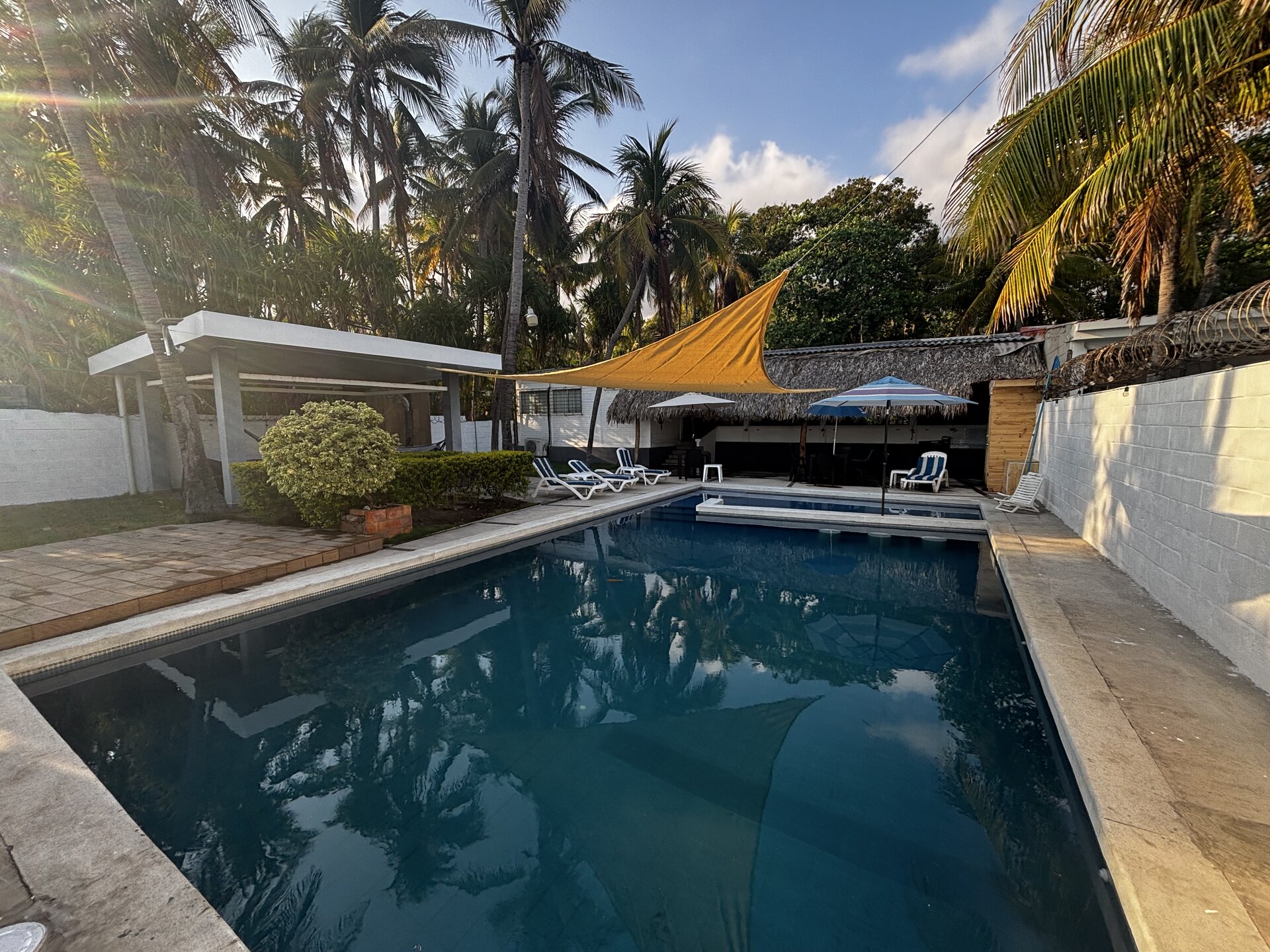 Private Pool with Palm Trees and Sun Shade – Oceanfrontsunsetvilla, La Libertad El Salvador